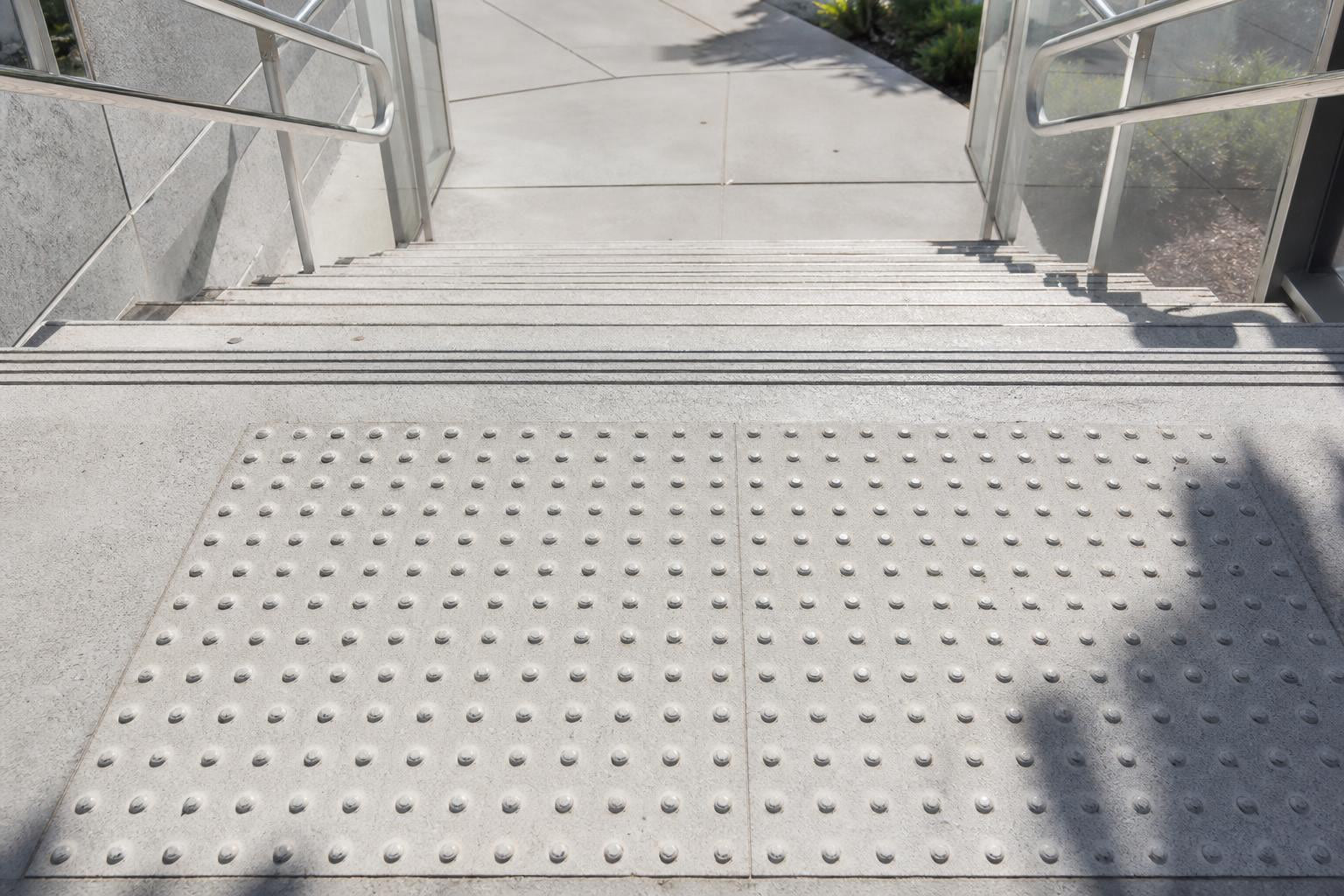 Tactile Indicators at Stairs: 2026 Codes, Specs & Placement